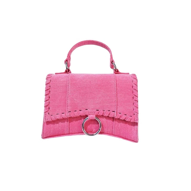 a pink handbag with a ring handle