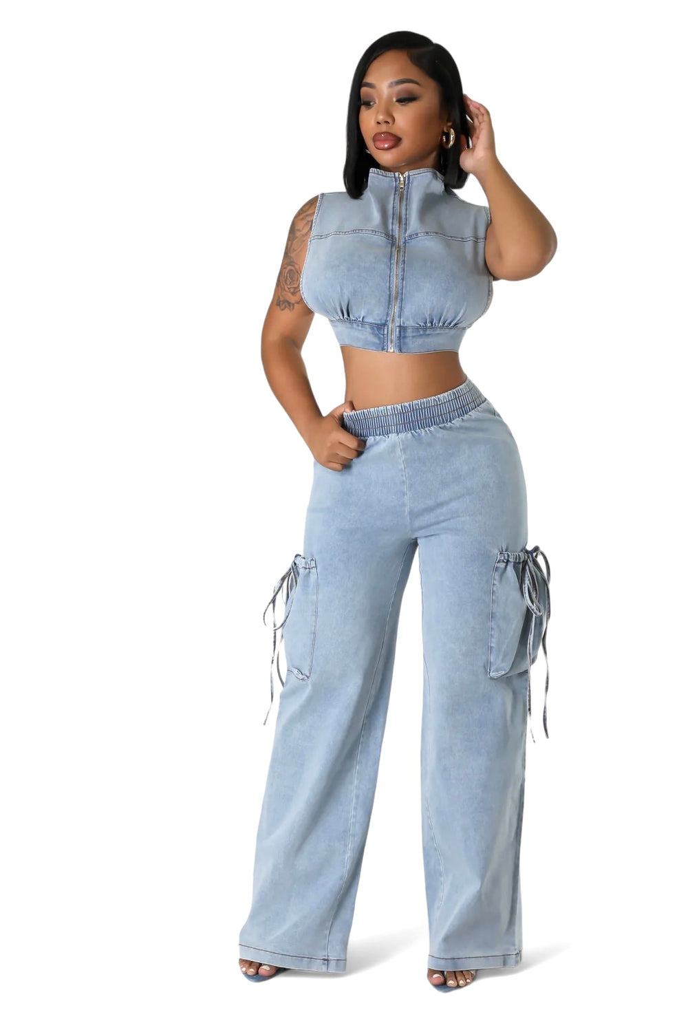 a woman in a crop top and jeans