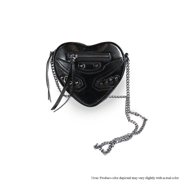 a black heart shaped purse with chains hanging from it