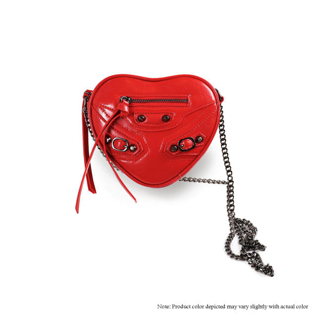 a red heart shaped purse on a chain