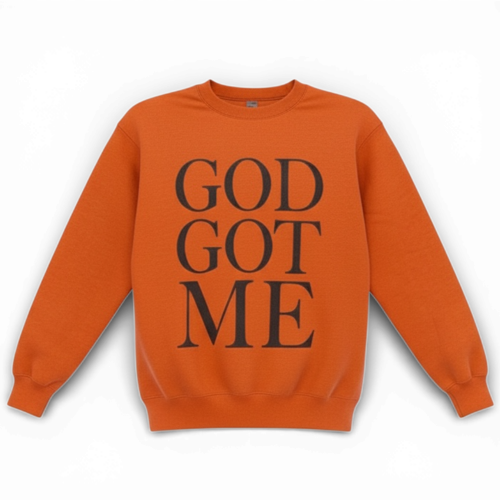 Orange sweatshirt with 'GOD GOT ME' text on a white background