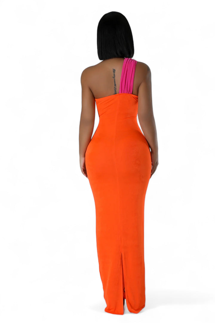 the back of a woman wearing an orange dress