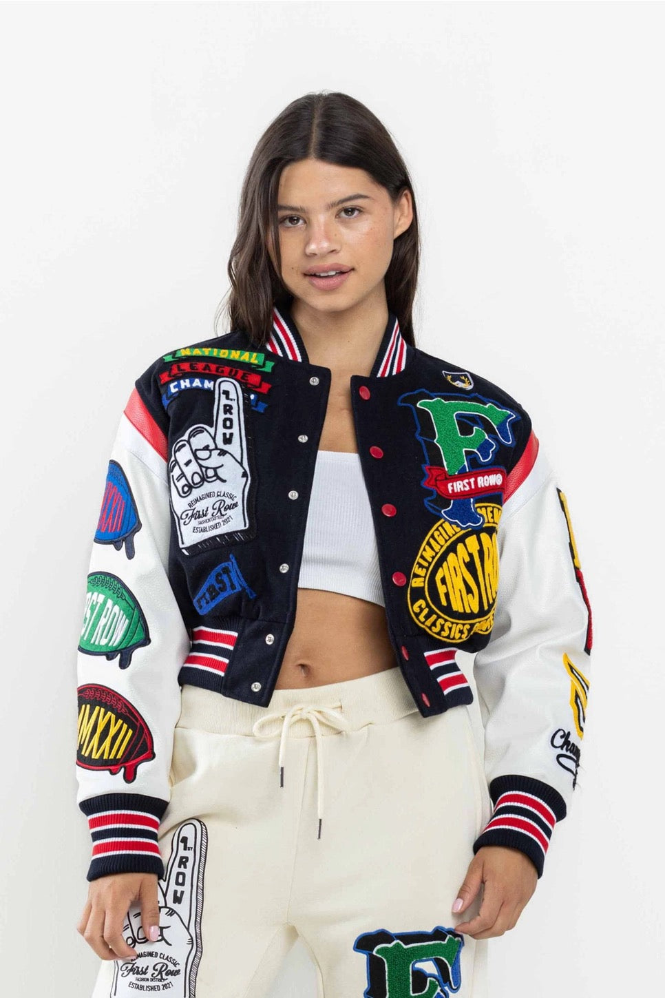 Model front view in varsity jacket with vibrant patches