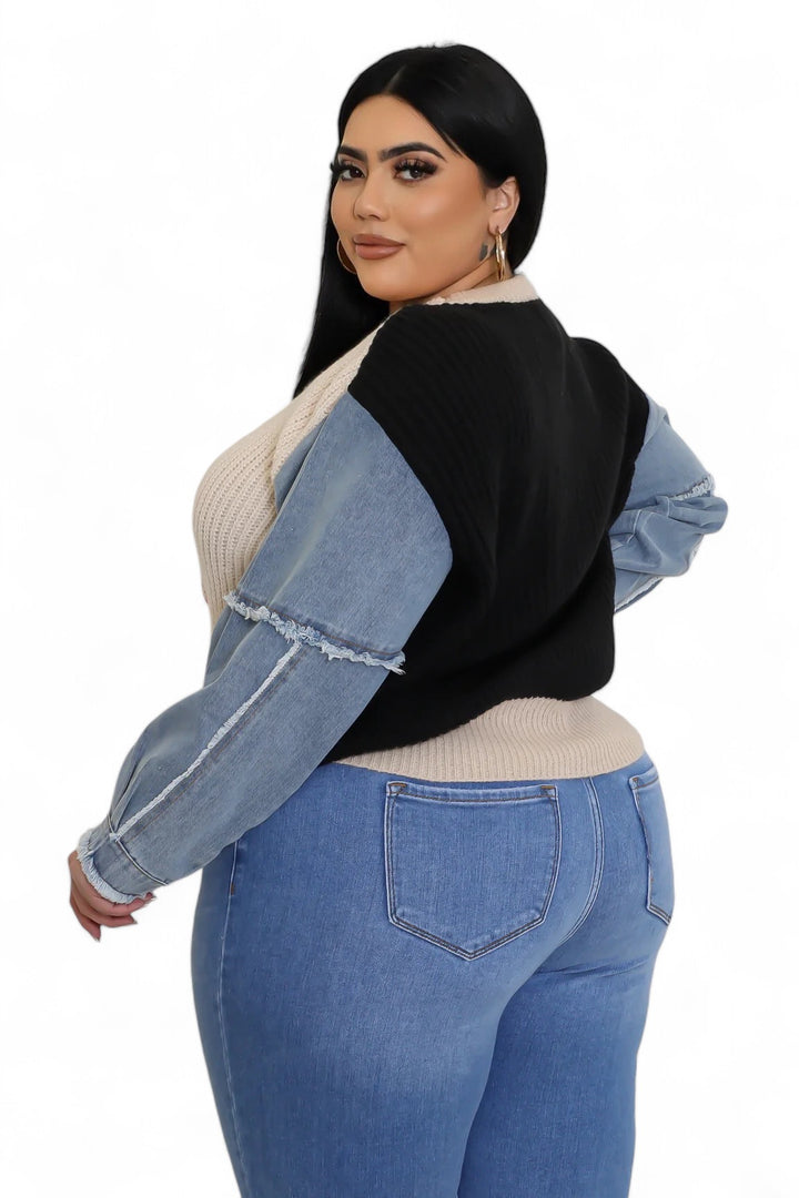 Side view of curvy sweater with denim sleeves