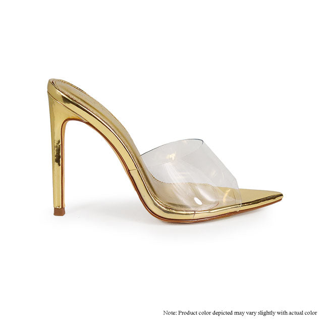 a pair of gold colored shoes with clear heels