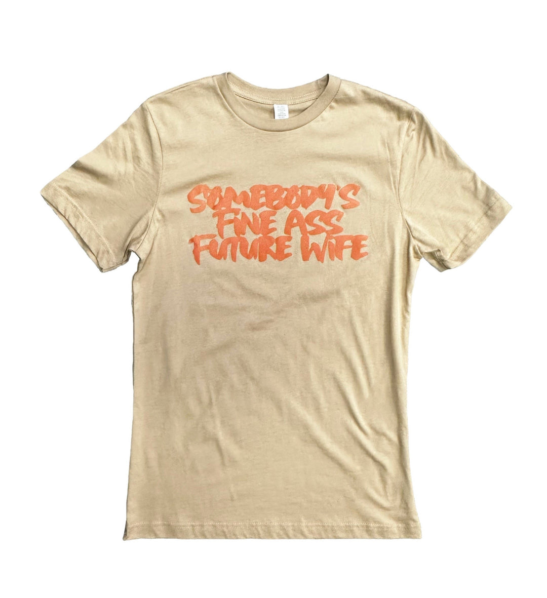 a white t - shirt with orange writing on it