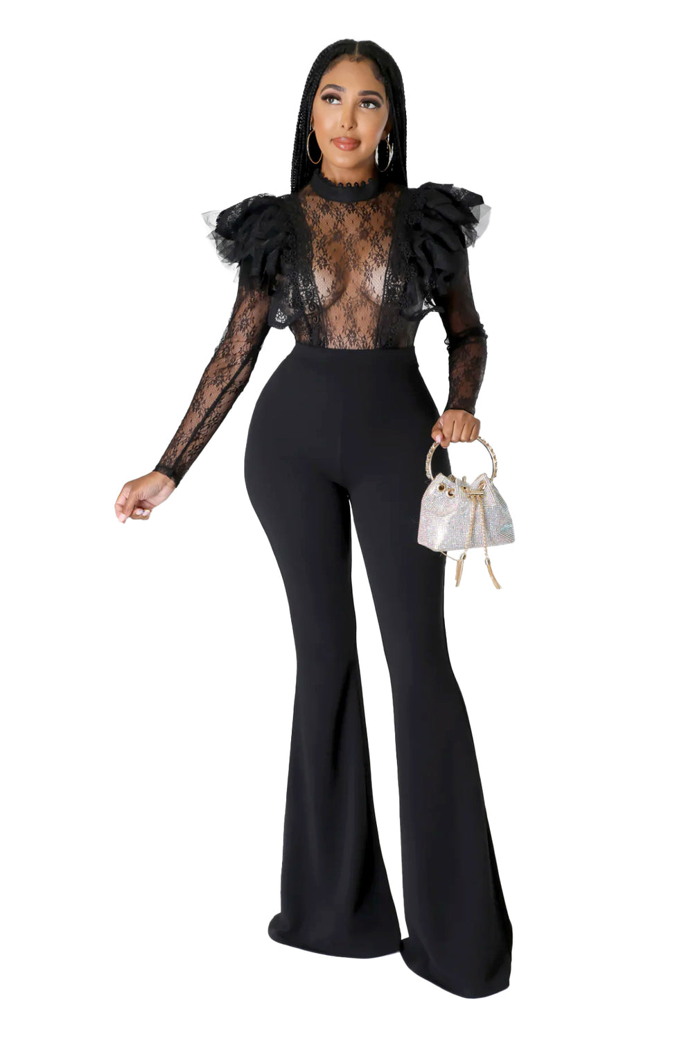 a woman in a black lace top and black pants