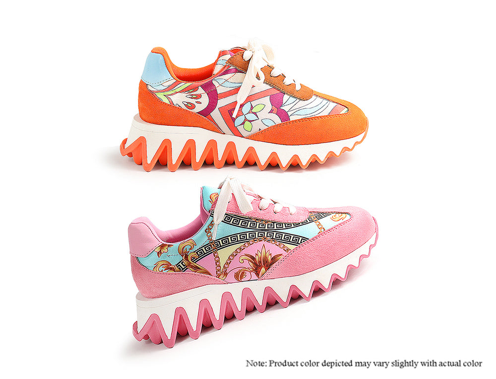 a pair of shoes with colorful floral designs on them