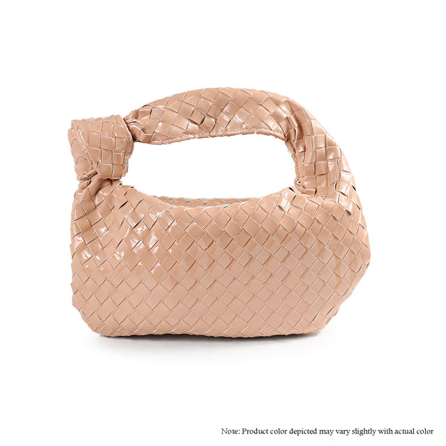 a beige woven bag on a white background