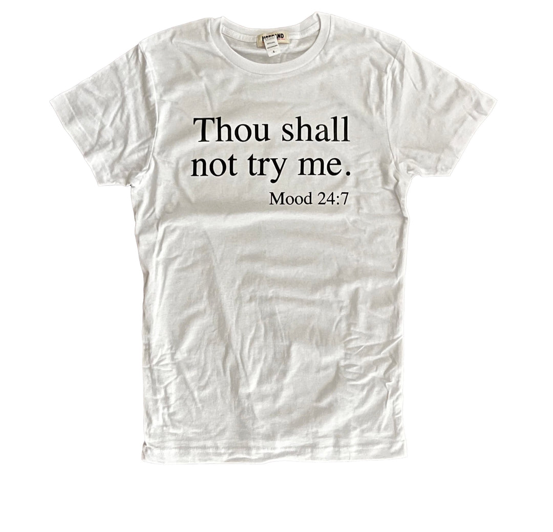 a white t - shirt that says thou shall not try me
